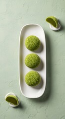 Delicious matcha cream puffs dessert on white plate food photography green aesthetic sweet treat pastry delight