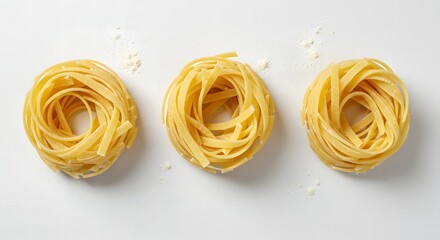 Delicious italian pasta food tagliatelle nests on white background gourmet cuisine ingredient carbohydrate
