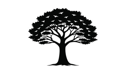Black silhouette of a lush deciduous tree