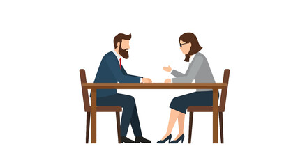 Two business professionals engaged in a discussion seated at a table.