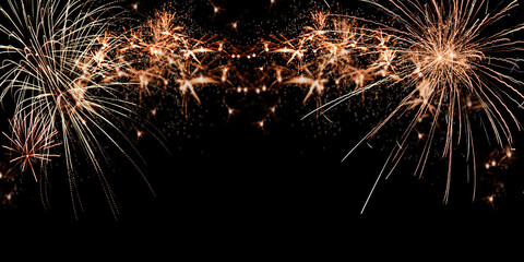 Fireworks sparklers gold colors on dark background. July 4th Independence Day, Memorial Day or...