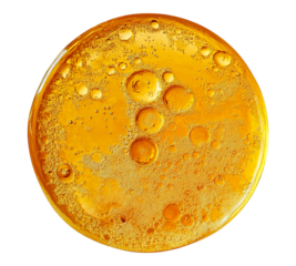 A yellow liquid with bubbles in it