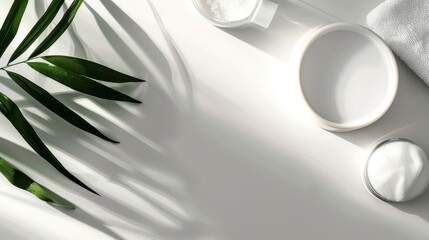 Minimalist beauty: Palm leaves cast shadows over white bowls and cream containers on clean surface, a serene spa-like composition.
