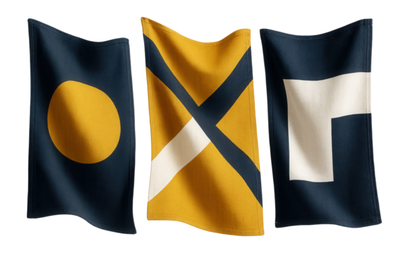 Large fabric flags with bold geometric patterns, used as a statement piece in a modern loft.