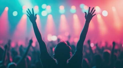 Fan raising hands, immersed in vibrant music and colorful lights at an electronic dance music festival, creating a dynamic and energetic atmosphere