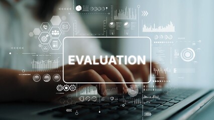 Person Using Laptop With Overlay of Evaluation Graphic and Data Analysis Elements in Modern Office Environment. Asymptotic smart data analytic.