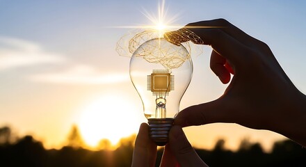 Innovative Smart Brain Concept Embodied in a Glowing Light Bulb Held in Hands Against a Sunset Sky