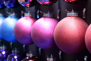 colorful Xmas tree balls hanging for sale at fair