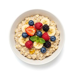 Healthy oatmeal bowl topped with fresh fruits and honey  