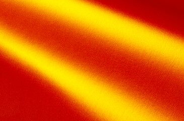 Abstract background with bright golden yellow texture. Shiny illuminated space with soft grainy glow