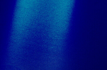Abstract background with grainy texture and dusty blue gradient. Noisy surface with speckled pattern