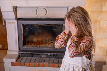 Little girl in folk dress crying with hands on face, Crying sensitive child, expressing deep...