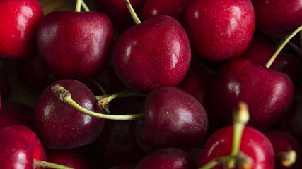 Juicy cherries with cuttings macro photography