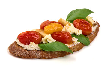 Bruschetta with cream cheese, cherry tomatoes and basil, isolated on white background