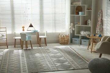 Stylish playroom with decor and furniture. Interior design