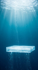A block of ice floats underwater, illuminated by ethereal sunbeams and rising bubbles