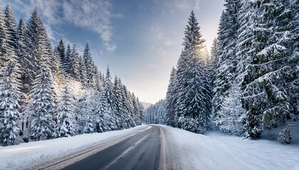 Fototapeta premium breathtaking snowy winter landscape featuring a serene road surrounded by majestic snow covered pine trees