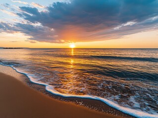 A serene sunset over a calm ocean with gentle waves washing onto a sandy beach under a dramatic cloudy sky.