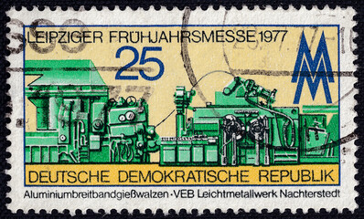 Light metal plant on a 1977 DDR vintage postage stamp. Leipzig Spring Fair 1977 Series.