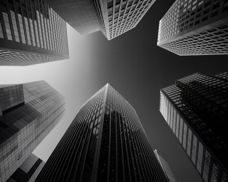 Low angle view of modern skyscrapers against a clear sky