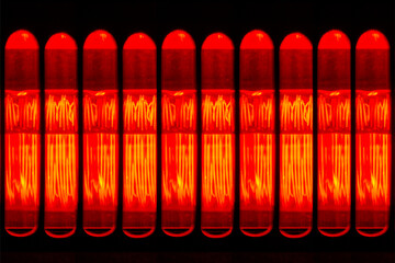 Close up of a electrical heater in red colour
