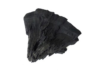 Natural wood charcoal is traditional charcoal made using hardwood isolated on a white background....