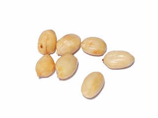 Peeled dry peanuts isolated on white background with clipping path. Group of peanuts. Fresh peanuts.