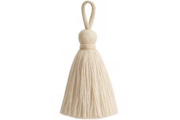 Neutral-toned yarn tassel suspended against translucent backdrop, complementing handcraft designs with organic texture