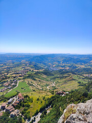 A view from the top of a mountain looking down on a valley