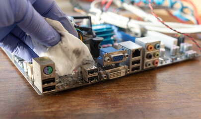 Clean the computer from dust.The process of cleaning the computer.