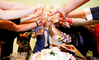 Making a champagne toast at a wedding.