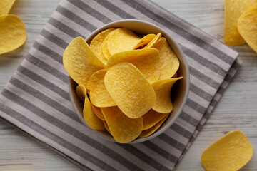 Potato Chips in a Bowl, top view. Flat lay, overhead, from above.