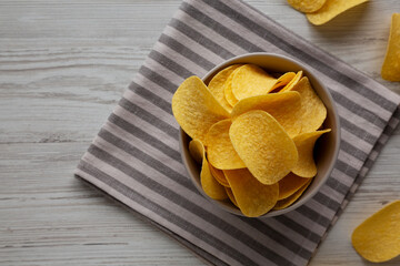 Potato Chips in a Bowl, top view. Flat lay, overhead, from above.
