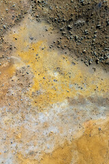 Cracked mud texture creating abstract patterns in desert landscape. Climate change
