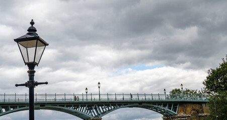 Selective focus on a Victorian street light with the cliff (Spa) bridge out of focus in the background. Captured in the seaside town of Scarborough