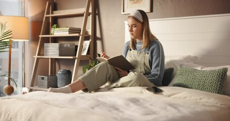 Student, writing and coffee with woman in bedroom for study schedule, journal or reminder. Assignment due date, academic calendar and notebook planning with person and tea on bed in home for research