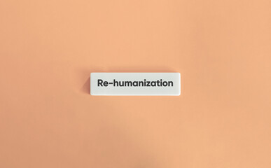Re-Humanization Concept on Wide Letter Tile with Soft Pink Background