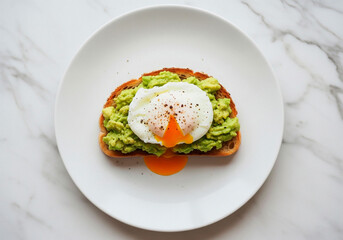 Avocado toast with poached egg on white plate for breakfast visuals, wellness lifestyle or food blog content