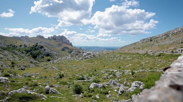 4k timelapse of Tulove Grede from Mali Alan Pass Stunning View of Croatia s Velebit Mountains with Rugged Limestone Peaks, Rocky Slopes, and a Dramatic Sky over the Remote and Untouched Dinaric Alps