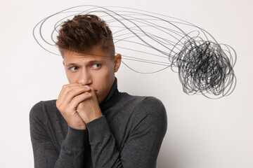 Worried man on white background. Confused thoughts as doodles around his head. Stress, anxiety,...