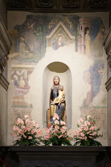 Romanesque polychrome wooden sculpture of Madonna and Child Enthroned, c. 1270, in Arezzo...