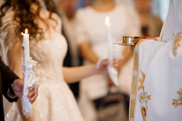 Orthodox Christian Wedding Ceremony: Lighting Candles, Priest Vestments, White Dress, Religious...