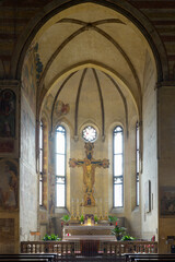 Interior of the Church of the Eremitani in Padua, Italy, highlighting the altar area and its Gothic...