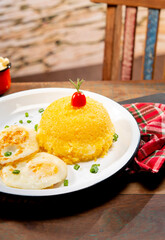 couscous sttufed with cheese with eggs in a beautiful countryside city setting ( cuzcuz )
