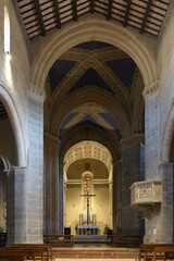 The interior of the Church of Sant'Andrea in Orvieto, Italy, showcasing Romanesque architecture...