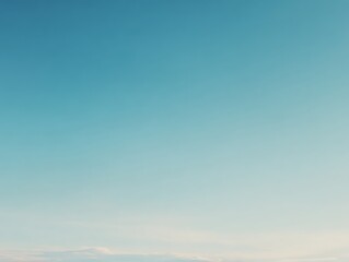 Minimal pale blue gradient sky with few clouds and soft cinematic light.