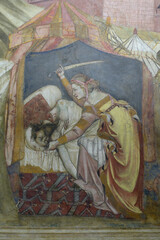 Fresco by Guariento depicting Judith beheading Holofernes in the Reggia Carrarese, Padua, Italy.