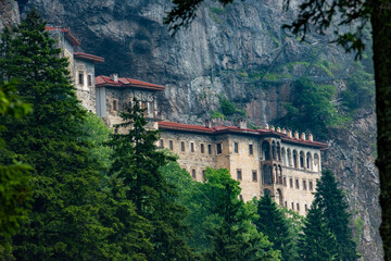 Sumela monastery is located in Trabzon province of T&uuml;rkiye.  The monastery is considered one of the leading holy places by Orthodox Christians. 