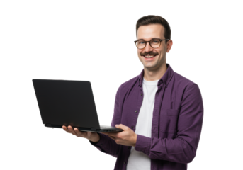 A young caucasian man in a purple shirt and white t-shirt, wearing eyeglasses, smiling at the camera while holding an open laptop, against a transparent studio background with copy space, clean