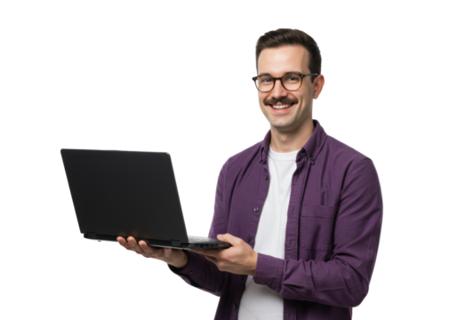 A young caucasian man in a purple shirt and white t-shirt, wearing eyeglasses, smiling at the camera while holding an open laptop, against a transparent studio background with copy space, clean
